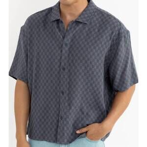 NEW RHYTHM. leads relaxed check tee in blue sea